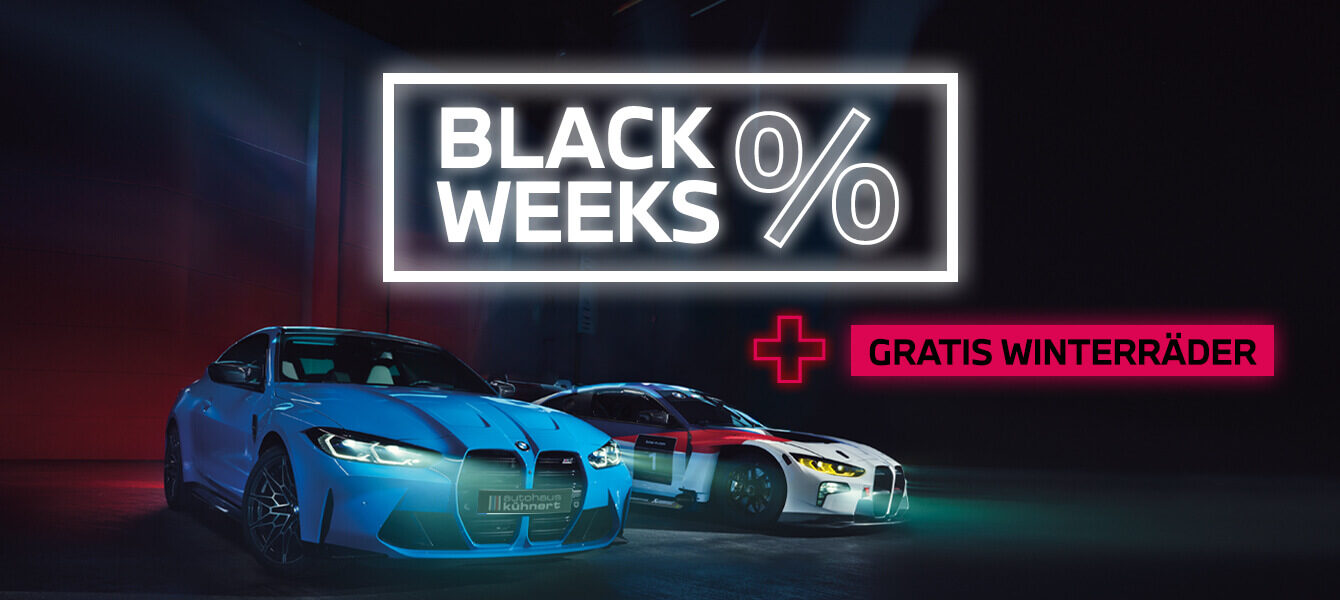BMW Black Weeks Keyvisual beim Autohaus Kühnert mit zwei BMW M Modellen, Neon-Schriftzug „Black Weeks %“ und Hinweis auf gratis Winterräder.