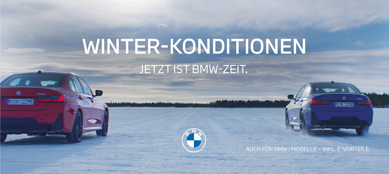 BMW Winter-Konditionen Kampagnenmotiv mit zwei BMW Limousinen auf verschneiter Fahrbahn