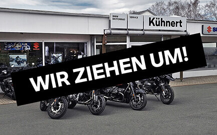 Motorrad Kühnert Filiale in Schwarzenbach-Saale mit Suzuki Motorrädern und Hinweis „Wir ziehen um“
